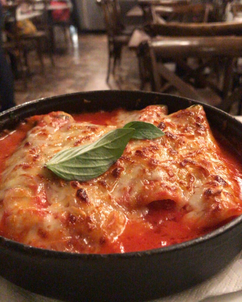 An oven-baked dish topped with basil